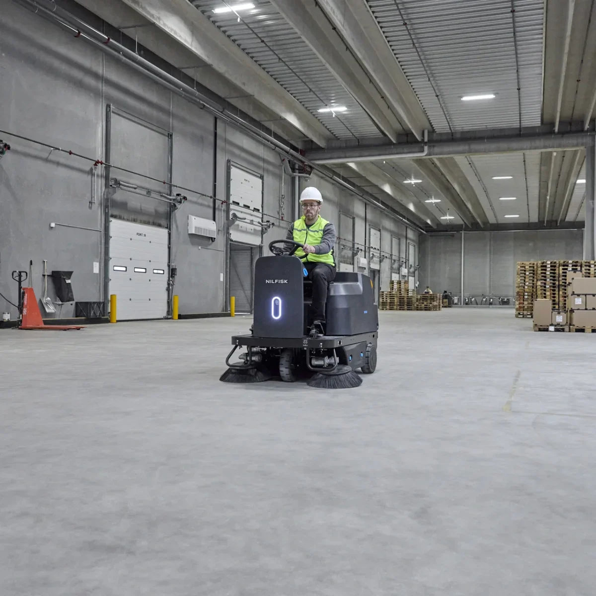 NilfiskÂ® SW3000â„¢ Ride-On Industrial Floor Sweeper w/ Li-Ion Batteries - 53" Sweeping Path